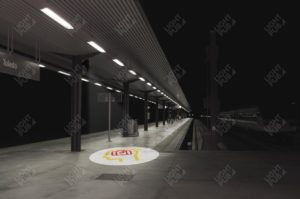 Projection lumineuse au sol bagage oublié quai de gare